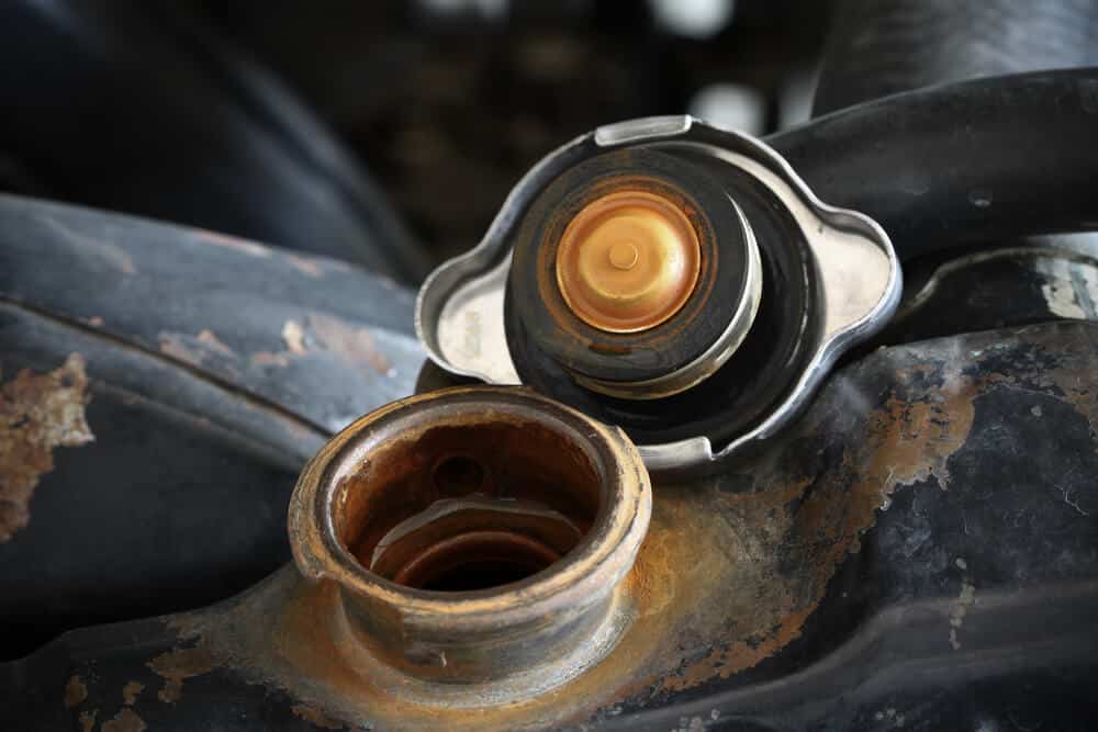 can a bad radiator cap cause coolant loss